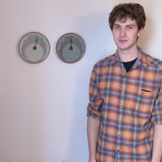 Video of a Olyssia Designs LLC  employee explaining how to set a Tide Clock
