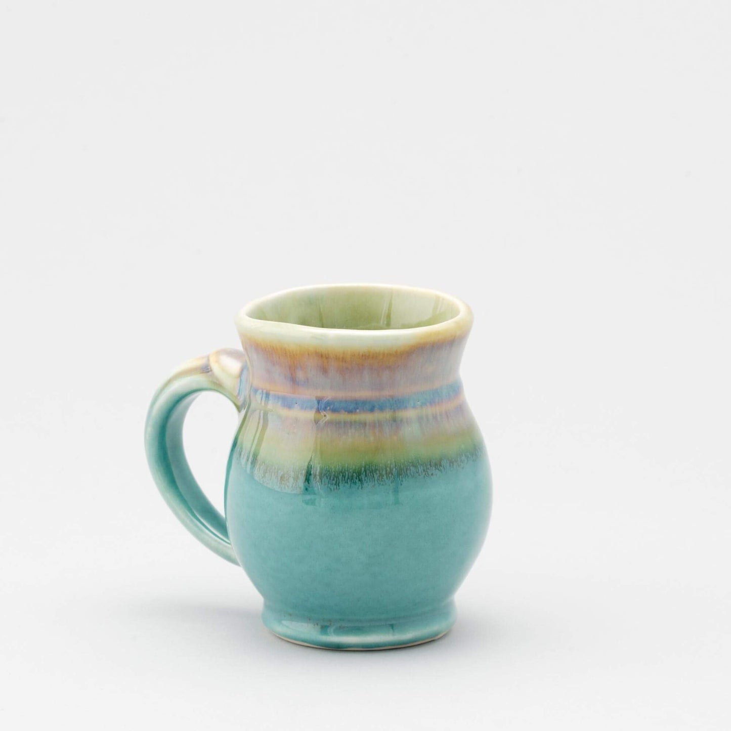 Handmade Pottery Curvy Mug made by Olyssia Designs LLC in US Green Oribe