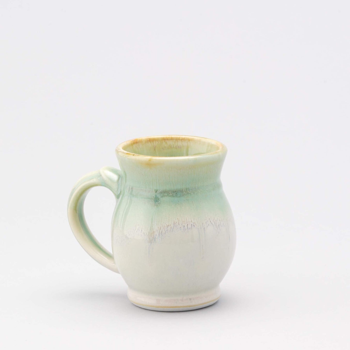 Handmade Pottery Curvy Mug made by Olyssia Designs LLC in US Ivory & Green Orible