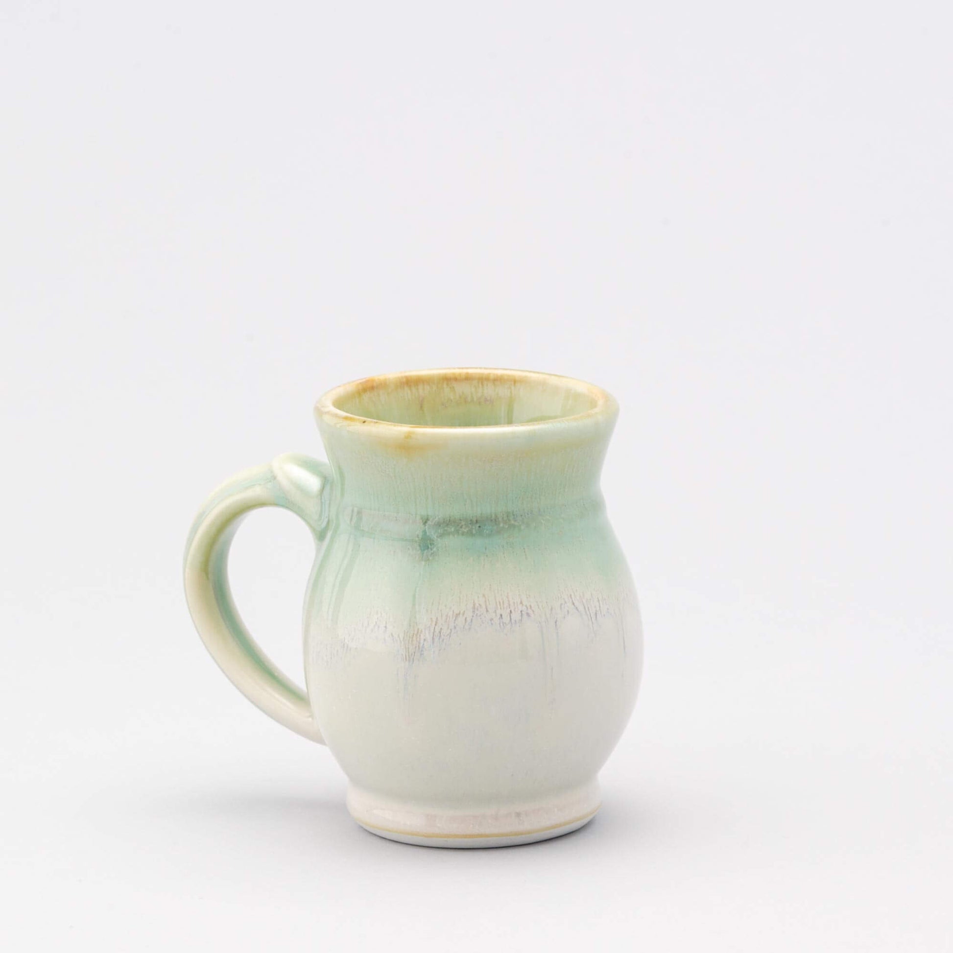 Handmade Pottery Curvy Mug made by Olyssia Designs LLC in US Ivory & Green Orible