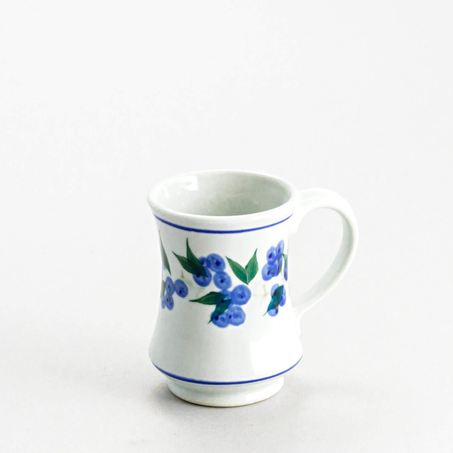 Handmade Pottery Pedestal Mug made by Olyssia Designs LLC in US Blueberry