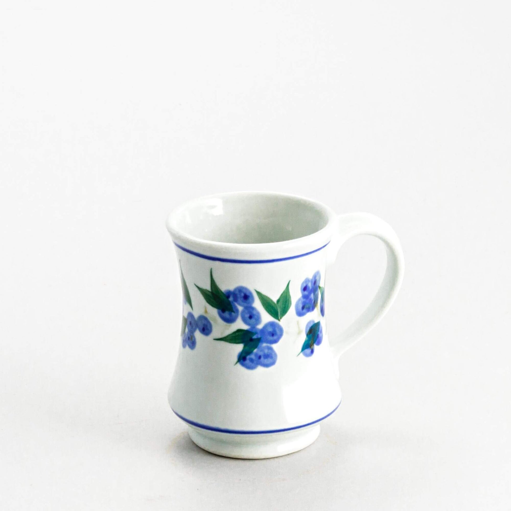 Handmade Pottery Pedestal Mug made by Olyssia Designs LLC  in US Blueberry