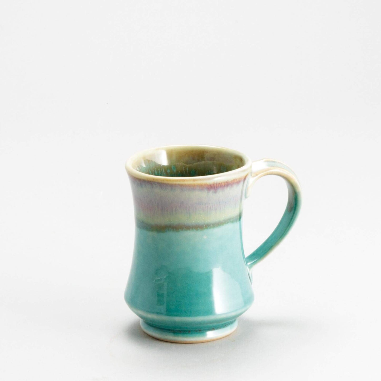 Handmade Pottery Pedestal Mug made by Olyssia Designs LLC in US Green Oribe