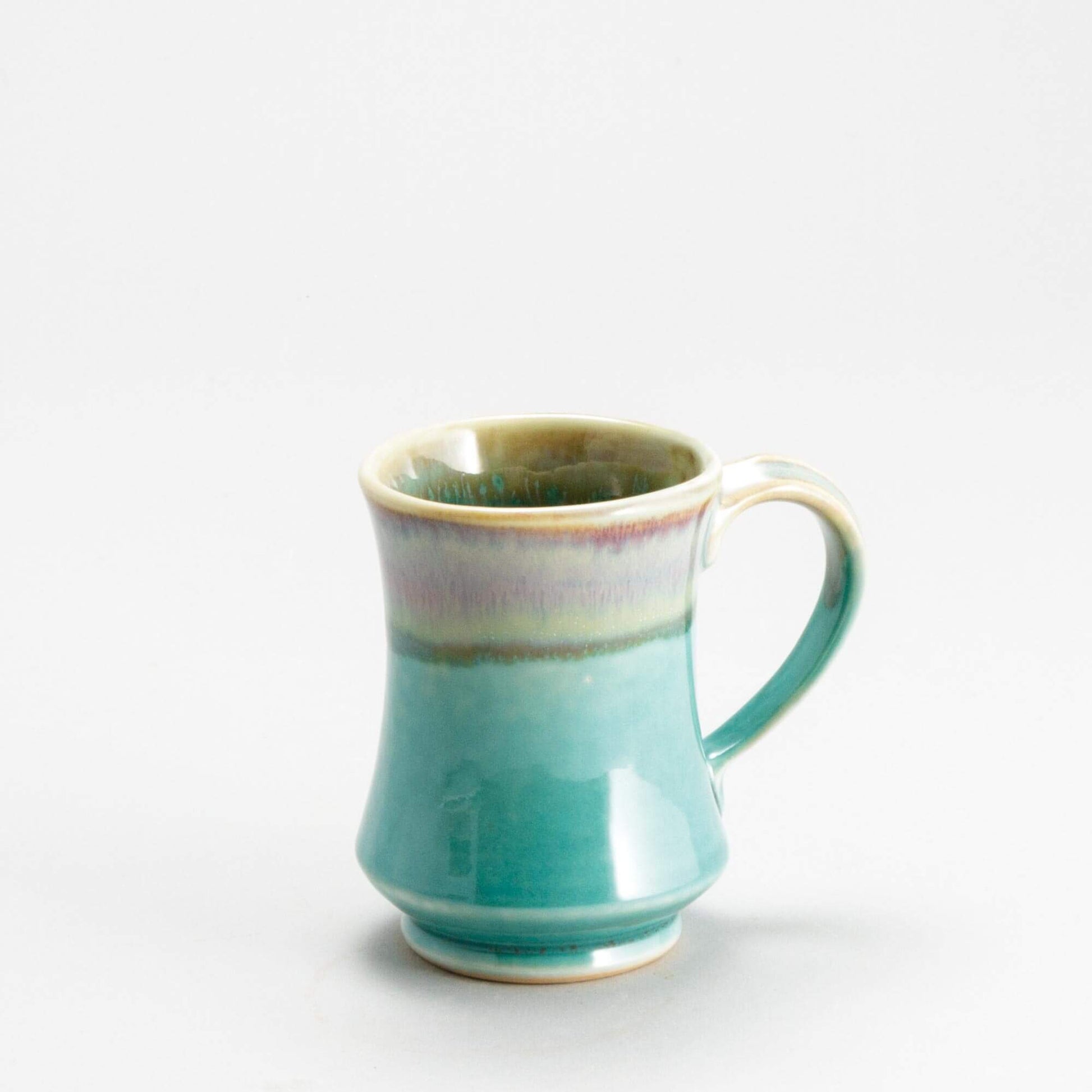Handmade Pottery Pedestal Mug made by Olyssia Designs LLC  in US Green Oribe