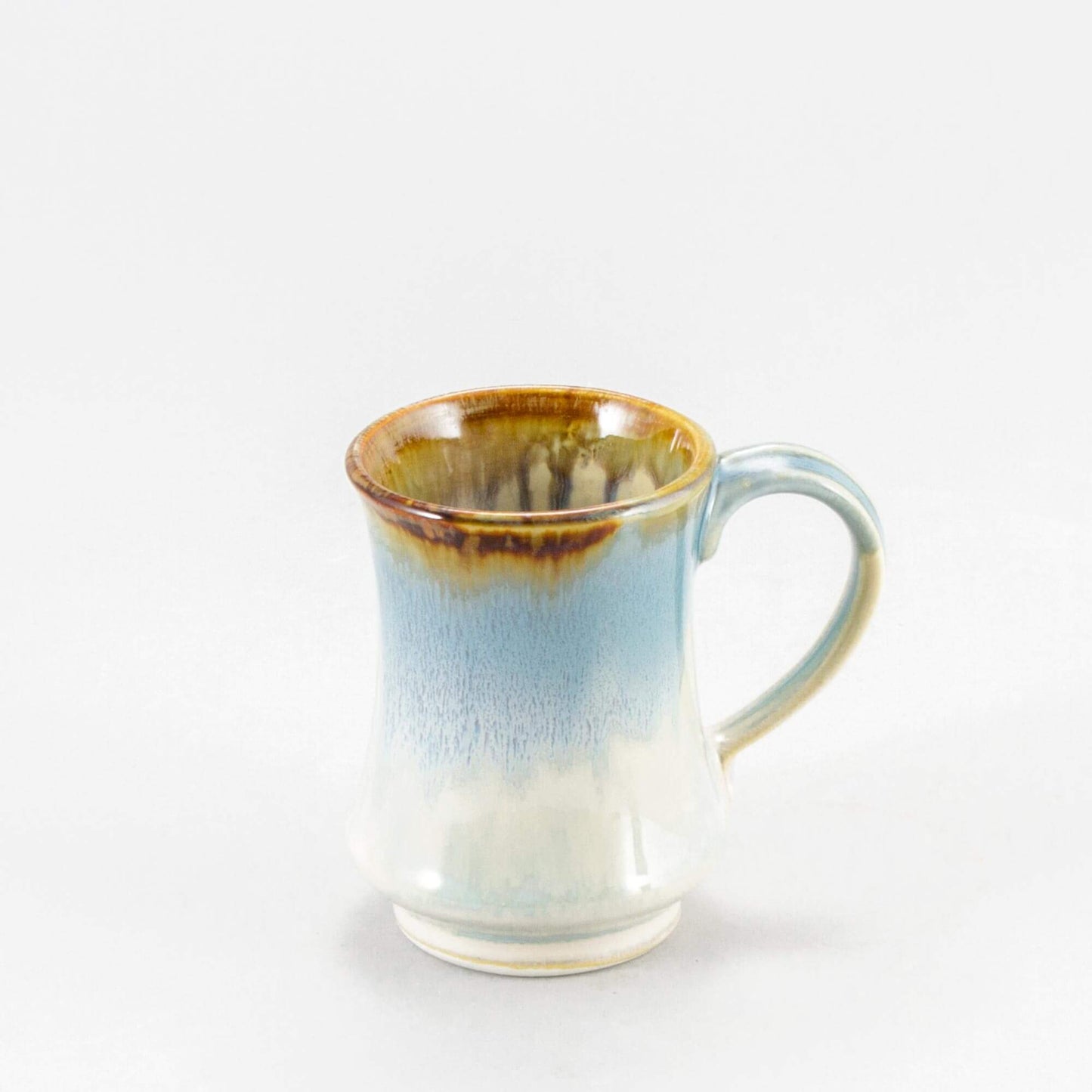 Handmade Pottery Pedestal Mug made by Olyssia Designs LLC in US Ivory & Blue