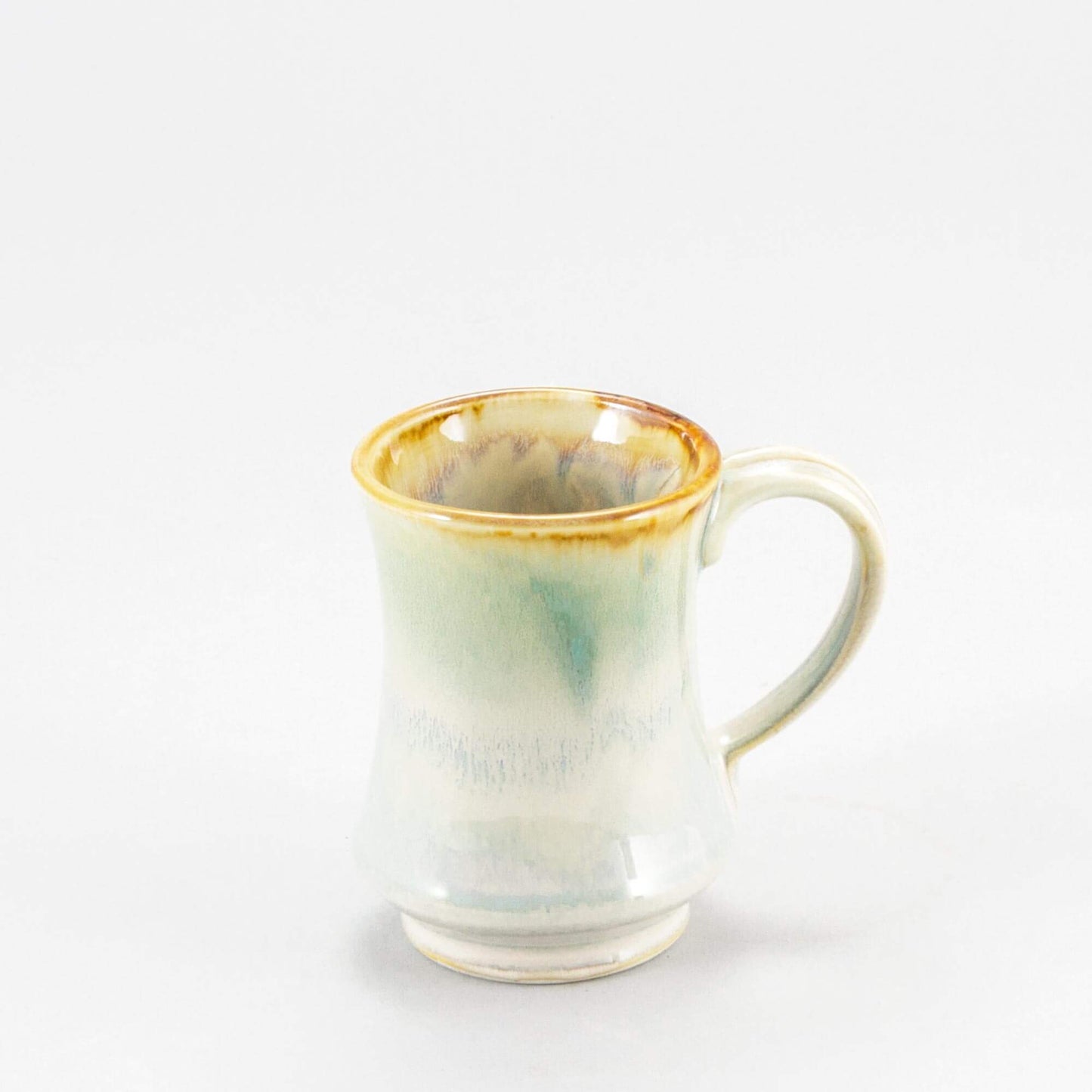 Handmade Pottery Pedestal Mug made by Olyssia Designs LLC in US Ivory & Green