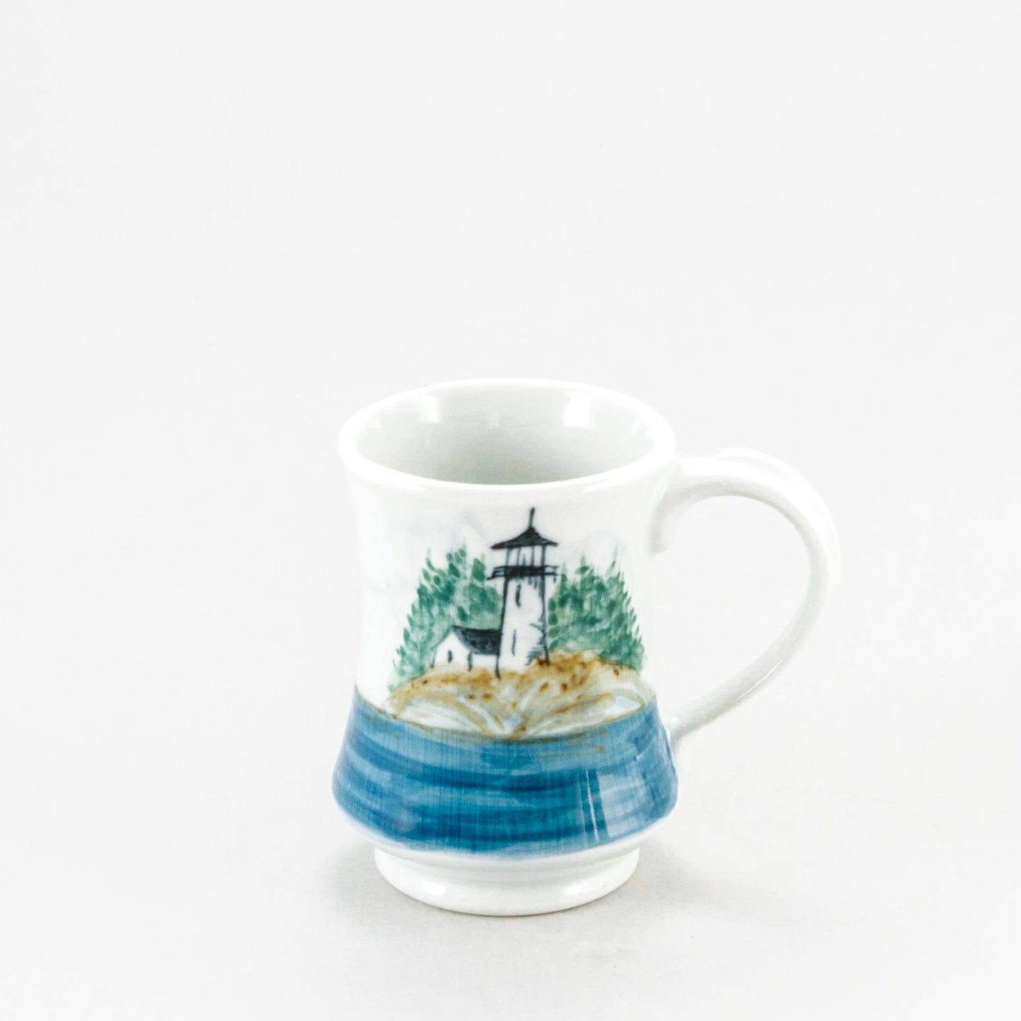 Handmade Pottery Pedestal Mug made by Olyssia Designs LLC in US Lighthouse