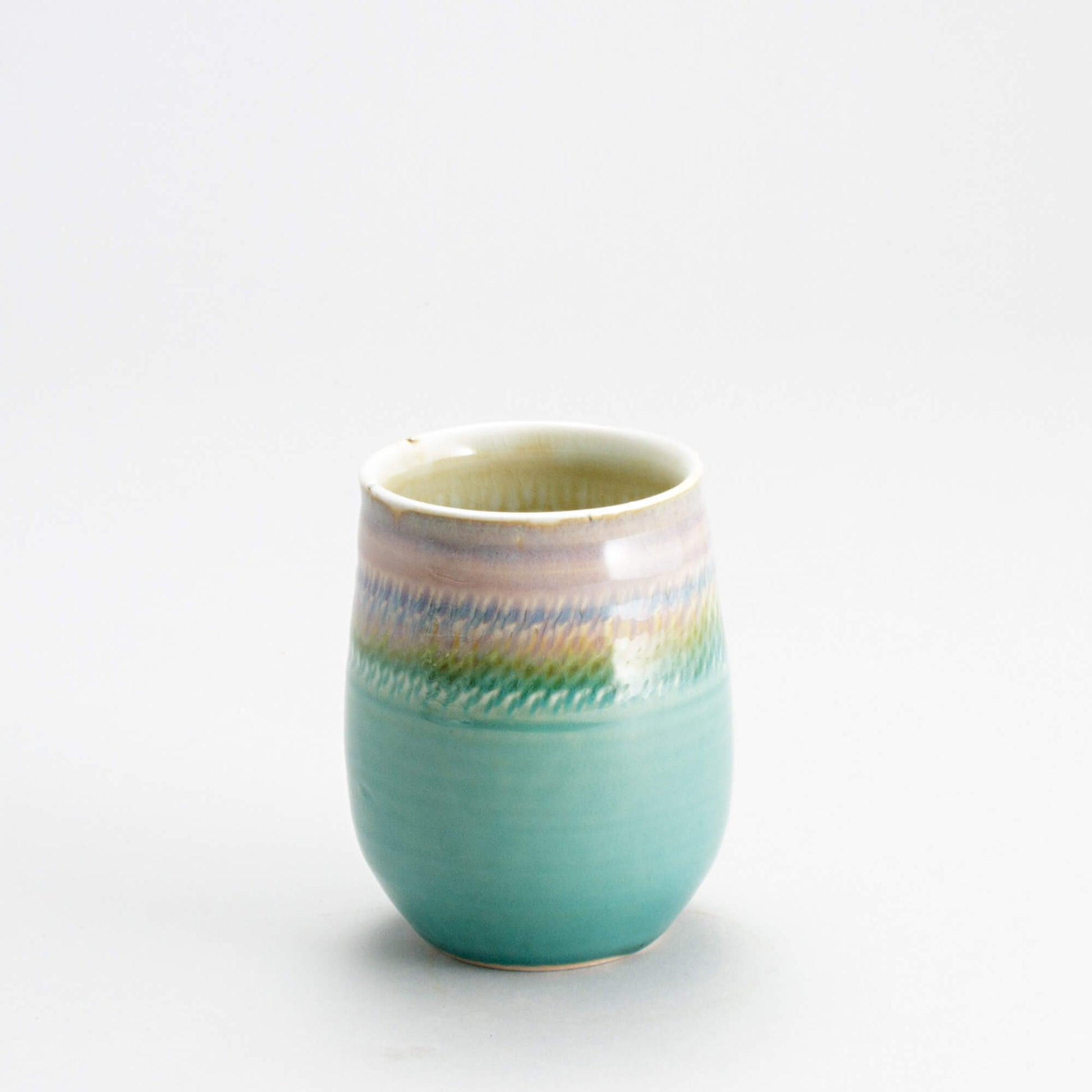 Handmade Pottery Stemless Wine Tumbler made by Olyssia Designs LLC  in US Green Oribe