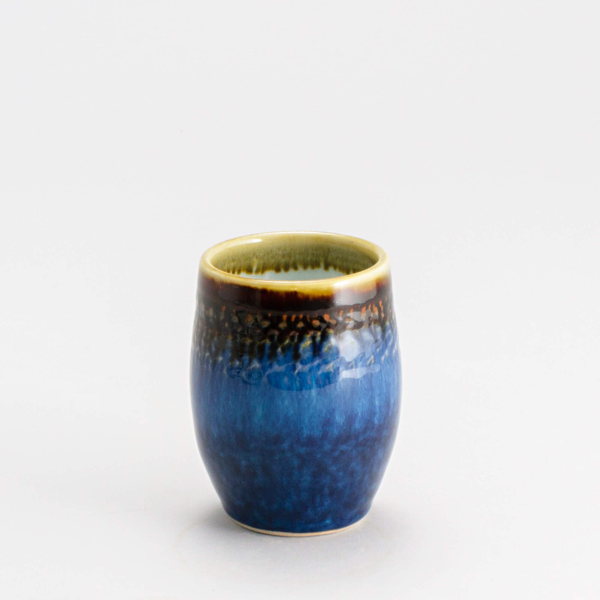 Handmade Pottery Stemless Wine Tumbler made by Olyssia Designs LLC  in US Blue Hamada