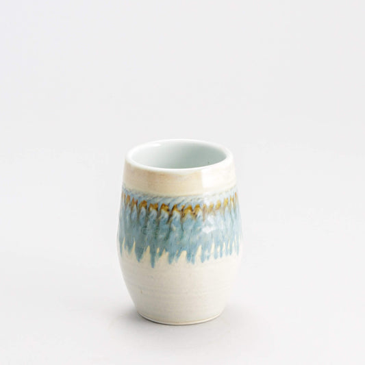 Handmade Pottery Stemless Wine Tumbler made by Olyssia Designs LLC  in US Ivory & Blue Oribe
