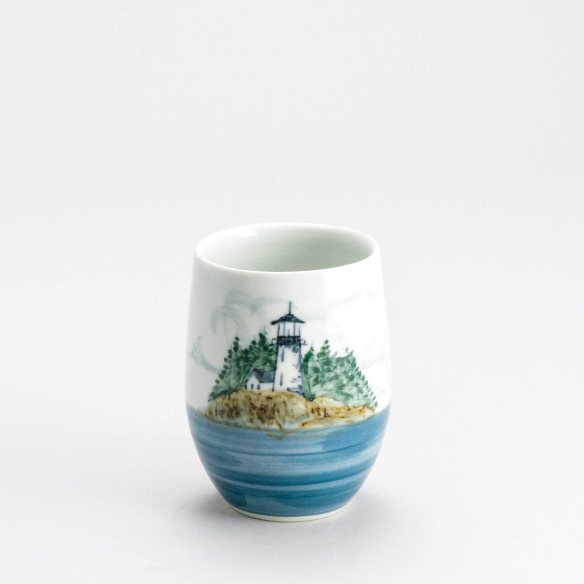 Handmade Pottery Stemless Wine Tumbler made by Olyssia Designs LLC  in US Lighthouse