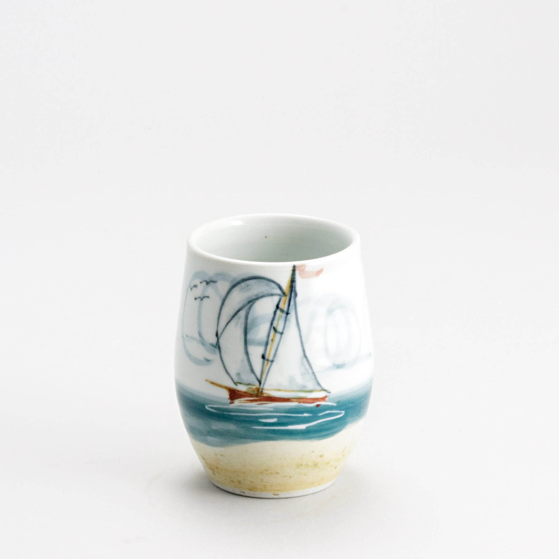 Handmade Pottery Stemless Wine Tumbler made by Olyssia Designs LLC  in US Sailboat