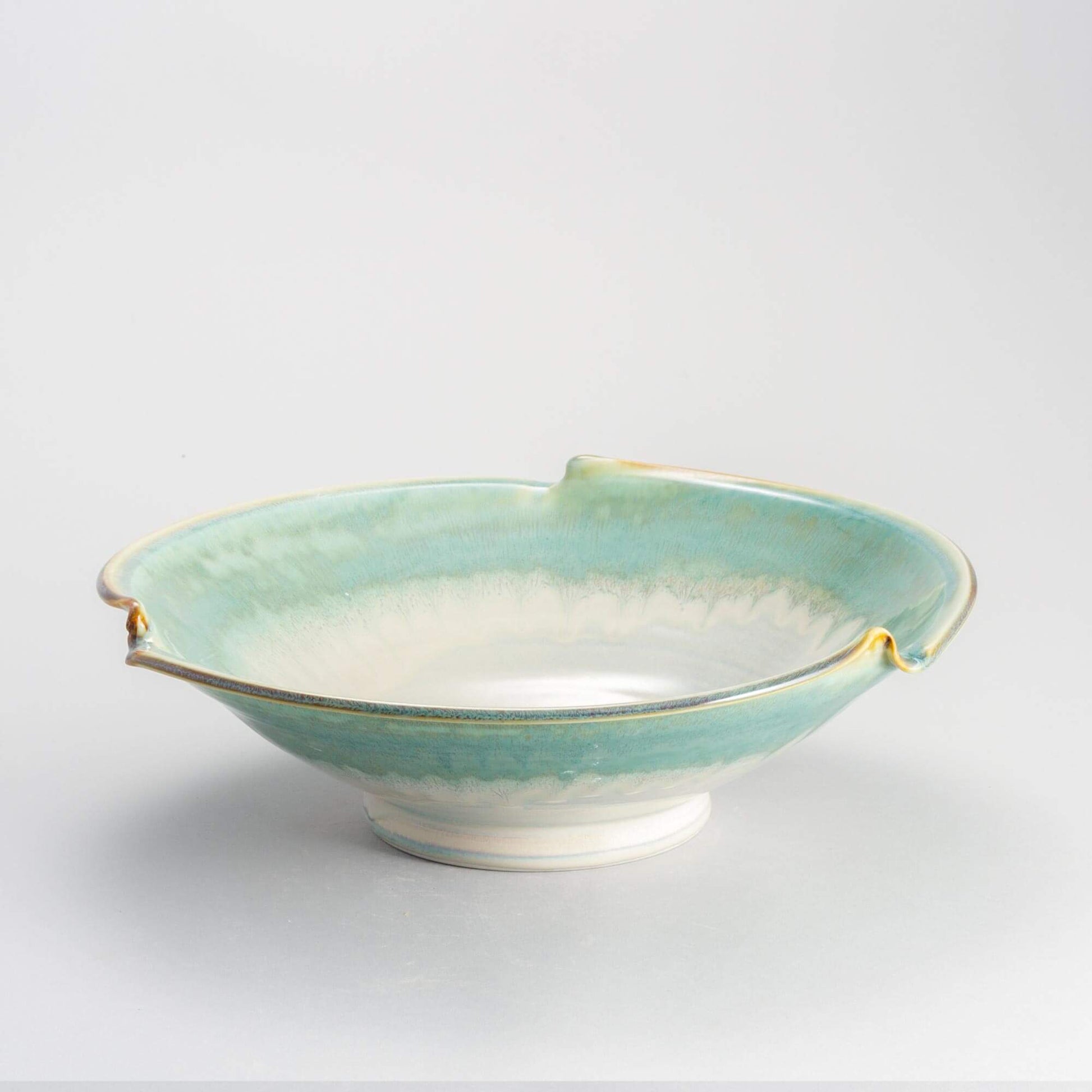 Handmade Pottery Signature Wave Bowl in Ivory & Green pattern made by Olyssia Designs LLC  in US