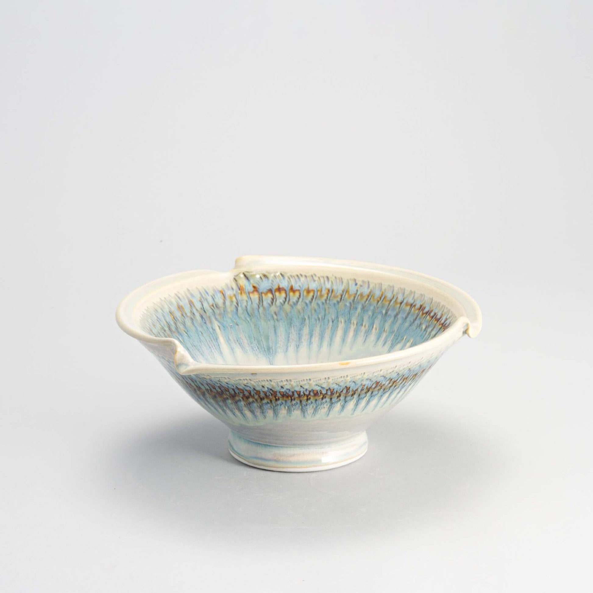 Handmade Pottery Signature Wave Bowl in Ivory & Blue pattern made by Olyssia Designs LLC  in US