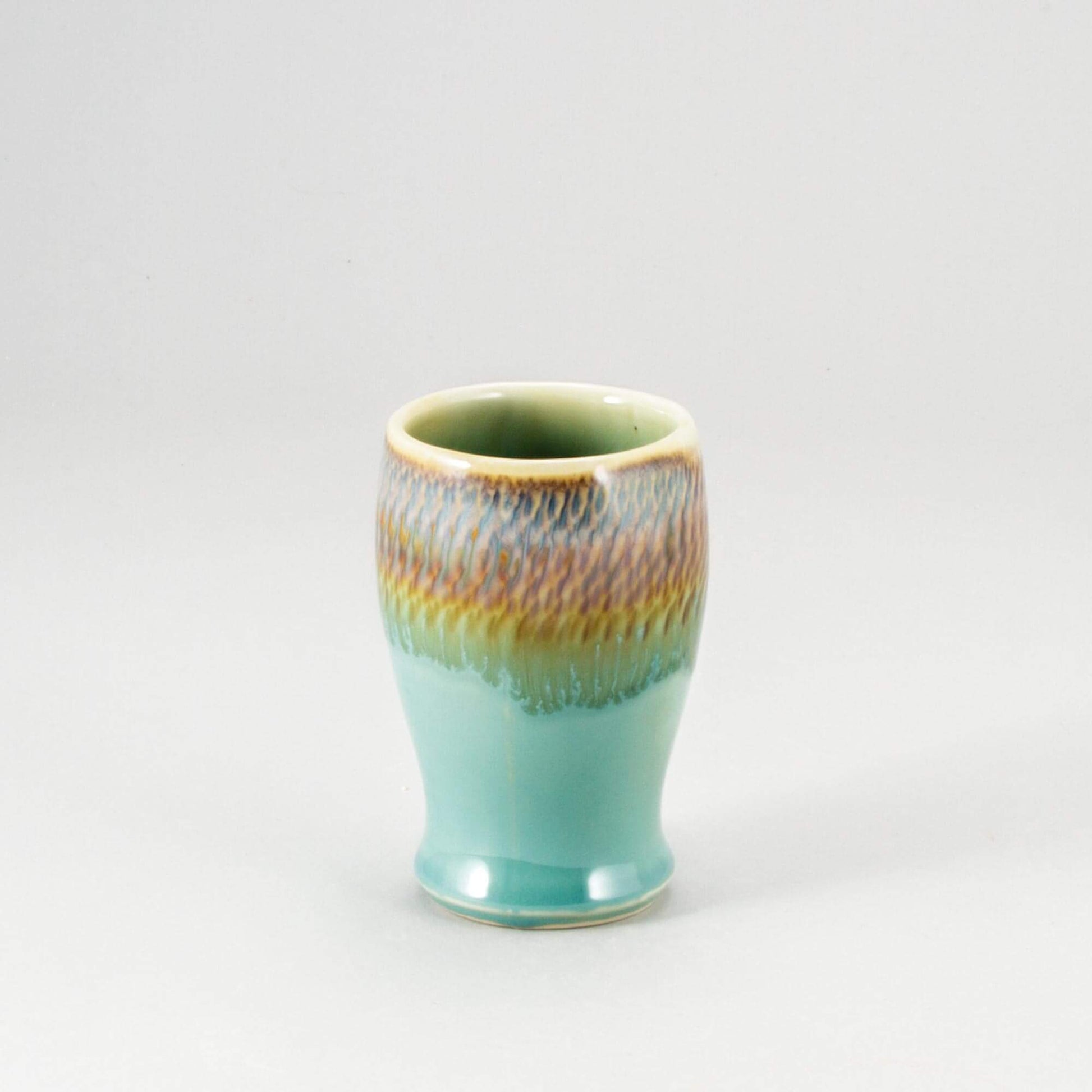 andmade Pottery Curvy Tumbler in Green Oribe pattern made by Olyssia Designs LLC in US