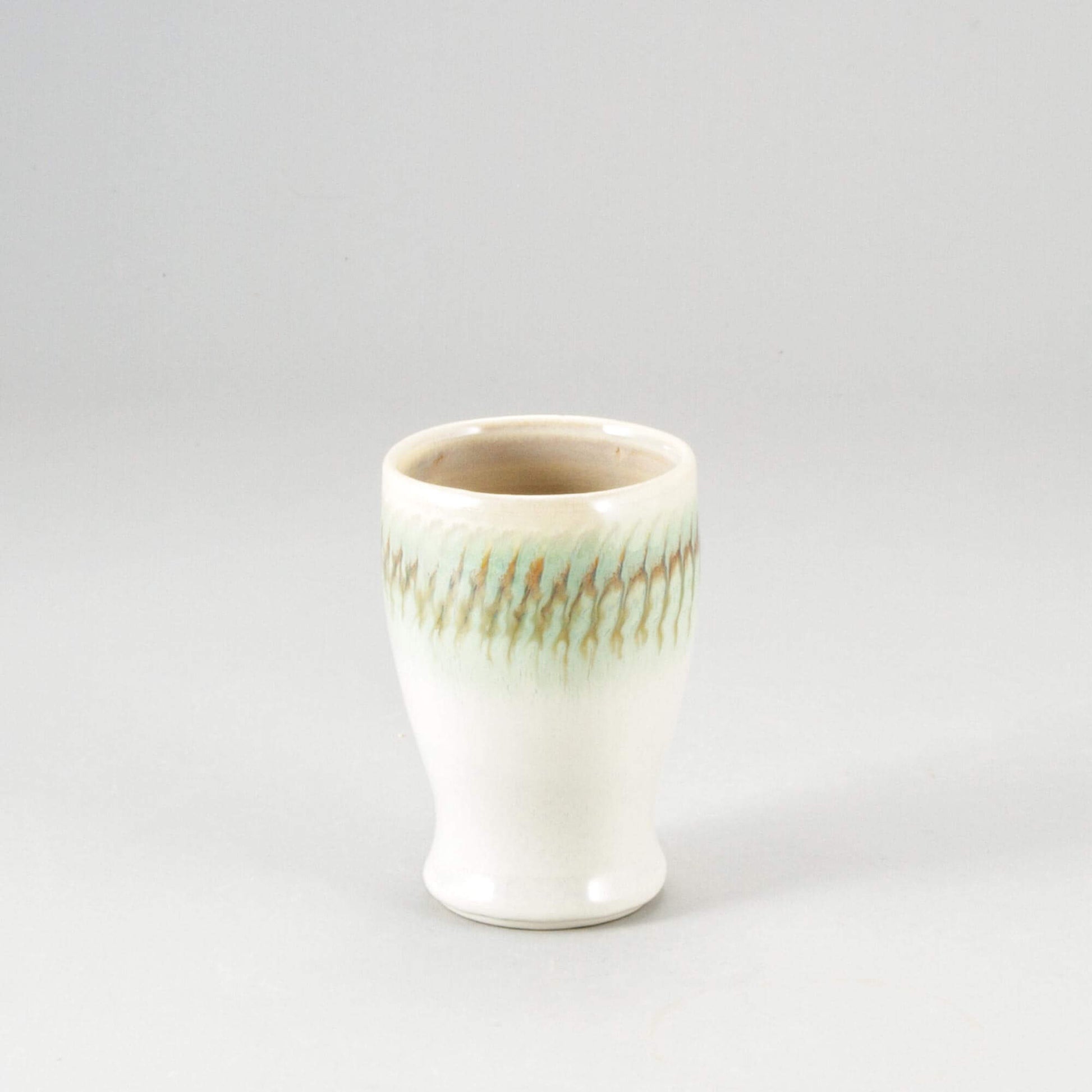 Handmade Pottery Curvy Tumbler in Ivory & Green pattern made by Olyssia Designs LLC in US