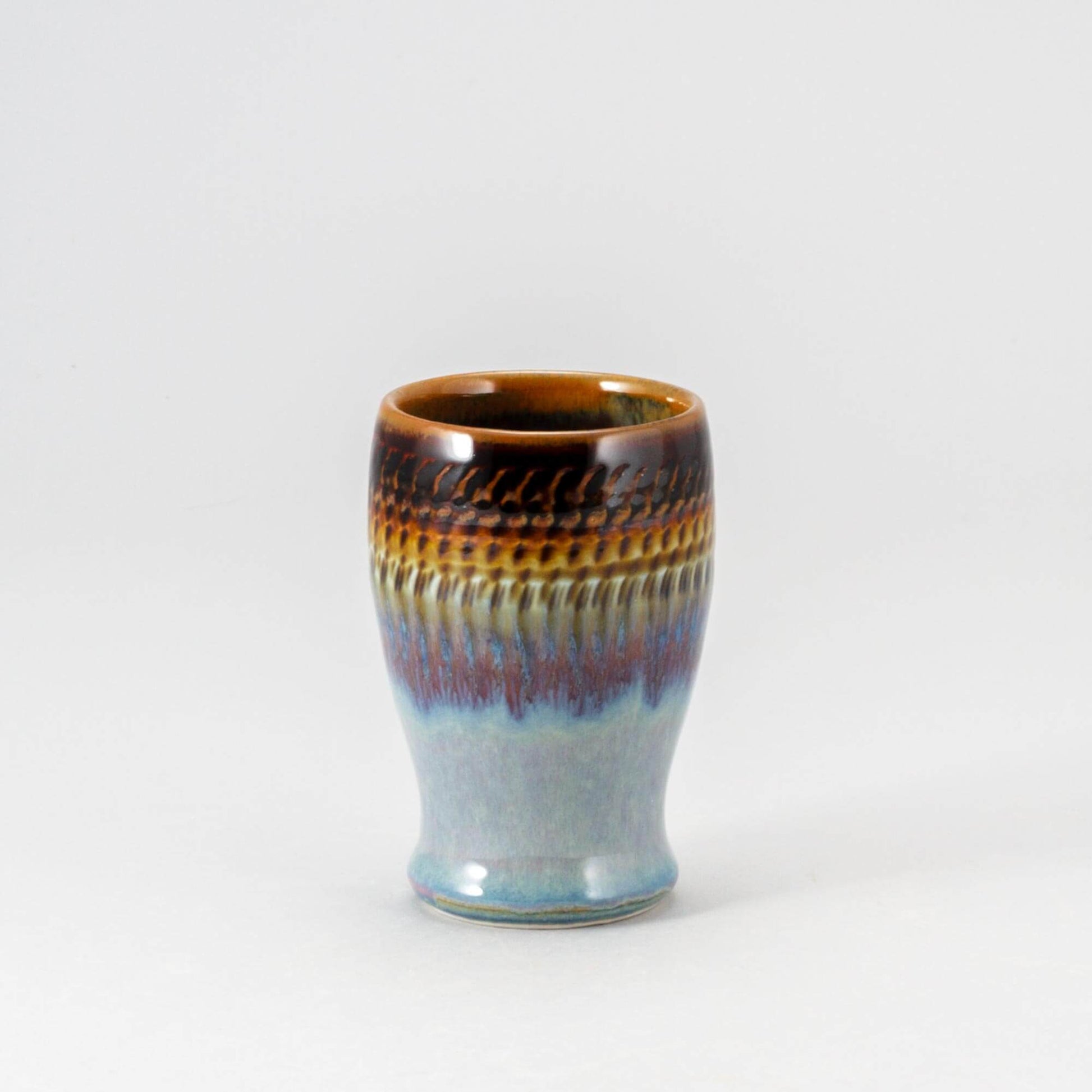 Handmade Pottery Curvy Tumbler in Purple Hamada pattern made by Olyssia Designs LLC in US
