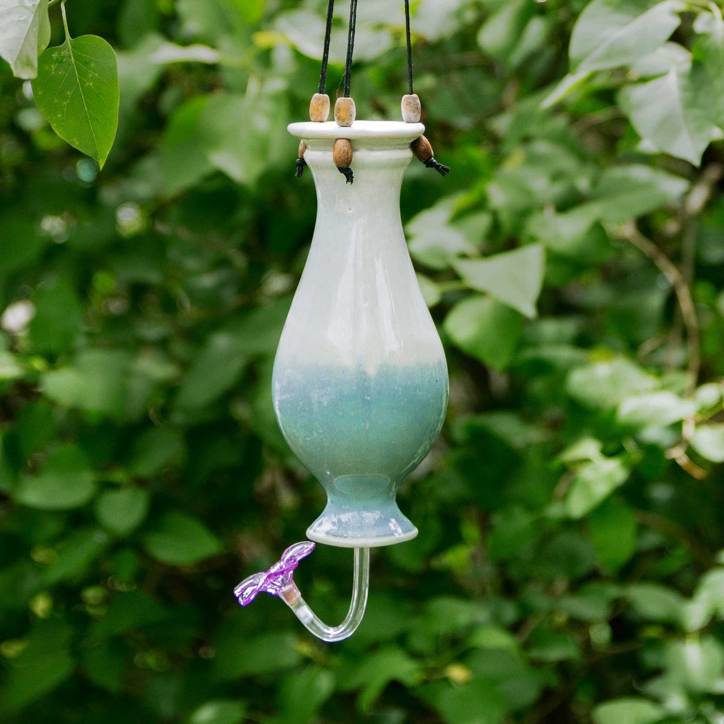 Handmade Pottery Bottle Hummingbird Feeder in Ivory & Blue pattern made by Olyssia Designs LLC in US