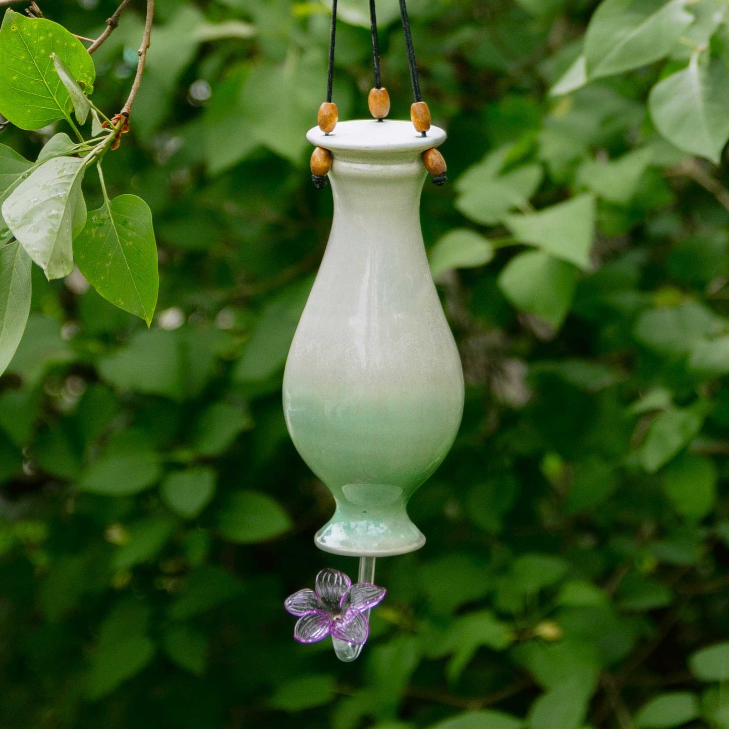 Handmade Pottery Bottle Hummingbird Feeder in Ivory & Green pattern made by Olyssia Designs LLC in US