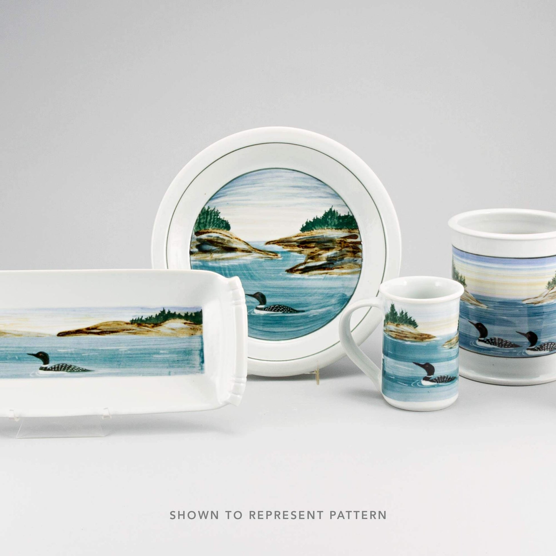 Handmade Pottery Curvy Mug in Loon pattern made by Olyssia Designs LLC in US