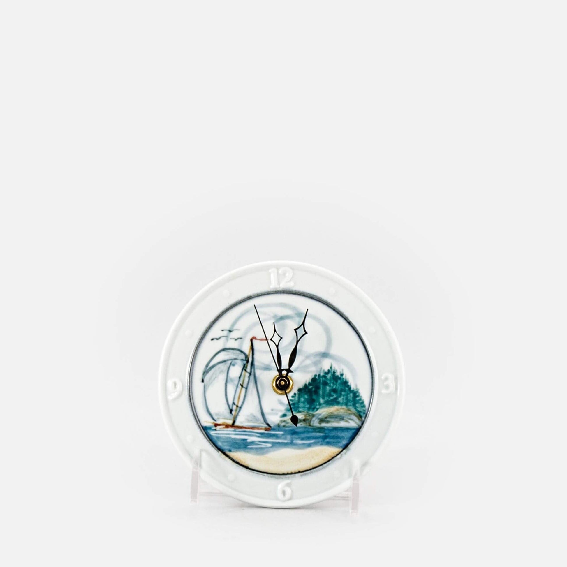 Handmade Pottery Small Clock w/ Stand in Sailboat pattern made by Olyssia Designs LLC  in US