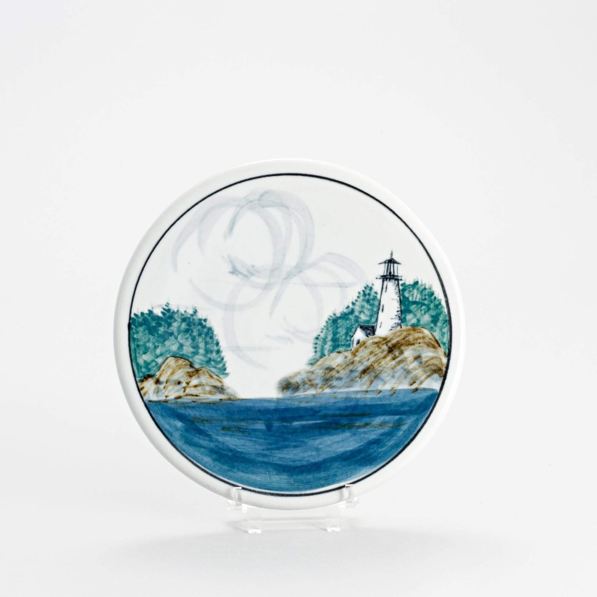 Handmade Pottery Trivet in Lighthouse pattern made by Olyssia Designs LLC  in US